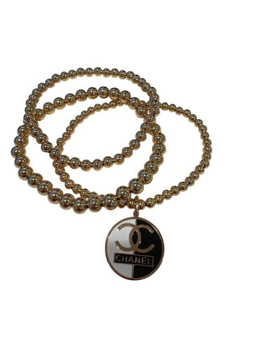 Gold Tone Stretch Bracelet - CC Black Logo